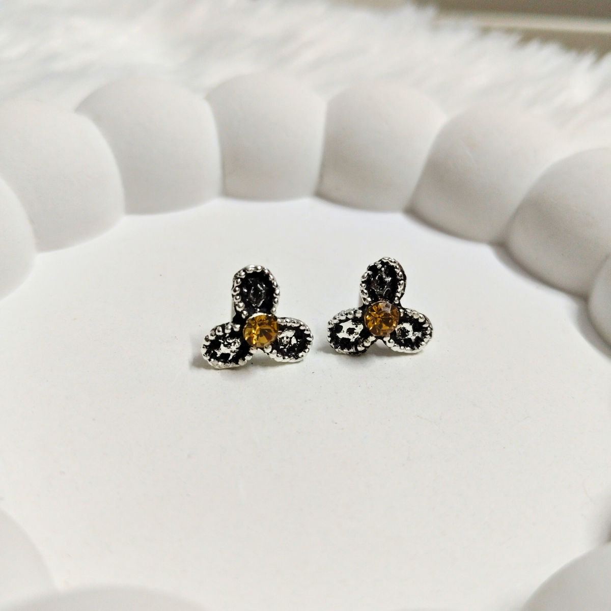 Vintage-2.png Vintage Flower Stud Earrings – Black Petals with Yellow Stone - Image 1
